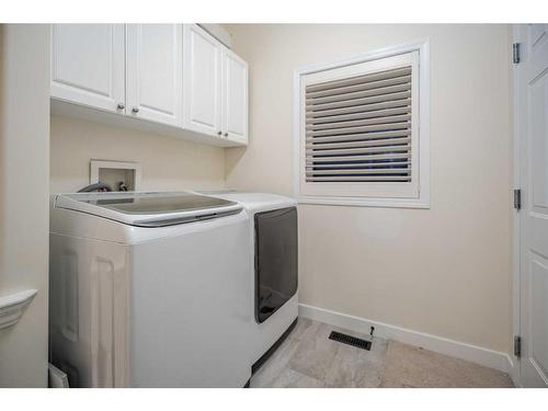 254 Discovery Ridge Way Sw, Calgary, AB - Indoor Photo Showing Laundry Room