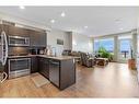 413-214 Sherwood Square Nw, Calgary, AB  - Indoor Photo Showing Kitchen With Stainless Steel Kitchen 