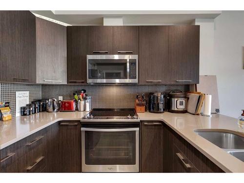 413-214 Sherwood Square Nw, Calgary, AB - Indoor Photo Showing Kitchen