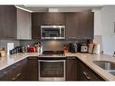 413-214 Sherwood Square Nw, Calgary, AB  - Indoor Photo Showing Kitchen 