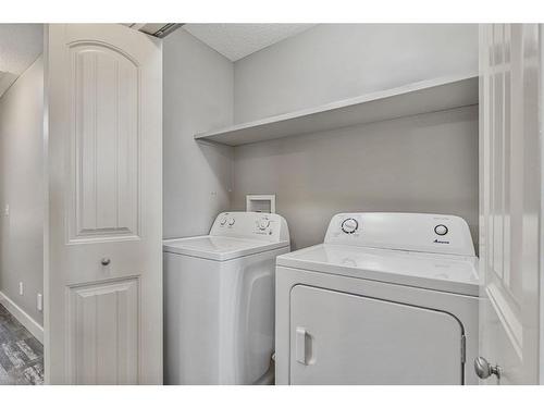 44 Sage Valley Drive Nw, Calgary, AB - Indoor Photo Showing Laundry Room