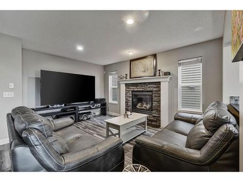 44 Sage Valley Drive Nw, Calgary, AB - Indoor Photo Showing Living Room With Fireplace