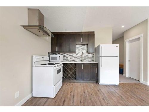 3326 42 Street Sw, Calgary, AB - Indoor Photo Showing Kitchen With Double Sink