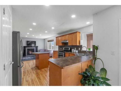 845 Luxstone Square Sw, Airdrie, AB - Indoor Photo Showing Kitchen With Double Sink