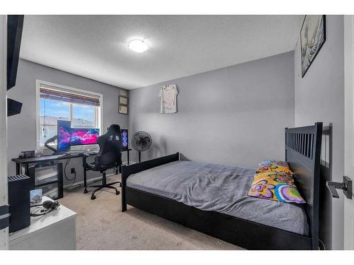 845 Luxstone Square Sw, Airdrie, AB - Indoor Photo Showing Bedroom