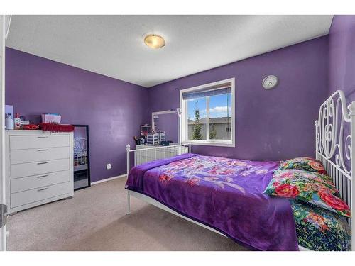 845 Luxstone Square Sw, Airdrie, AB - Indoor Photo Showing Bedroom