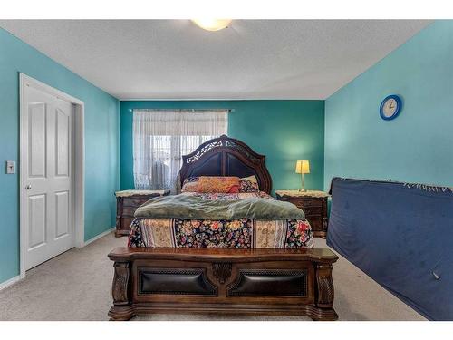 845 Luxstone Square Sw, Airdrie, AB - Indoor Photo Showing Bedroom