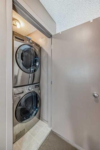 22-300 Evanscreek Court Nw, Calgary, AB - Indoor Photo Showing Laundry Room