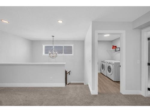 662 Creekmill Court Sw, Airdrie, AB - Indoor Photo Showing Laundry Room