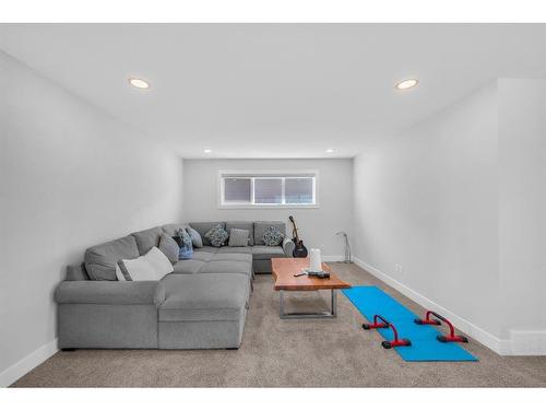 662 Creekmill Court Sw, Airdrie, AB - Indoor Photo Showing Living Room