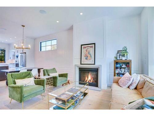 229 11A Street Ne, Calgary, AB - Indoor Photo Showing Living Room With Fireplace