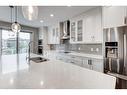 219 Cranarch Terrace Se, Calgary, AB  - Indoor Photo Showing Kitchen With Double Sink With Upgraded Kitchen 