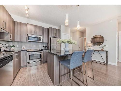 318-16 Sage Hill Terrace Nw, Calgary, AB - Indoor Photo Showing Kitchen With Upgraded Kitchen