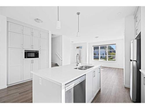 749 South Point Gate Sw, Airdrie, AB - Indoor Photo Showing Kitchen With Double Sink With Upgraded Kitchen