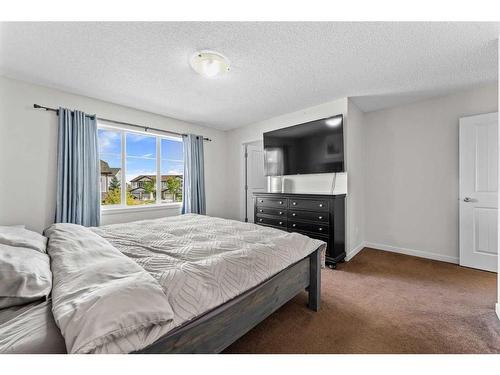 41 Copperpond Landing Se, Calgary, AB - Indoor Photo Showing Bedroom