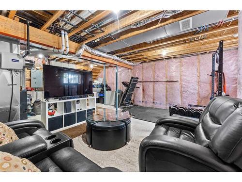 41 Copperpond Landing Se, Calgary, AB - Indoor Photo Showing Basement