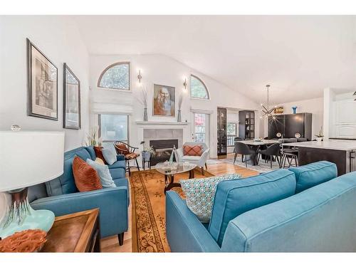 178 Oakbriar Close Sw, Calgary, AB - Indoor Photo Showing Living Room With Fireplace