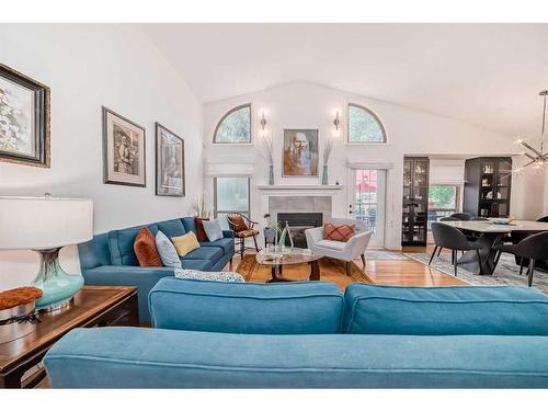 178 Oakbriar Close Sw, Calgary, AB - Indoor Photo Showing Living Room With Fireplace