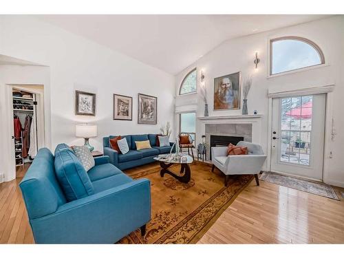 178 Oakbriar Close Sw, Calgary, AB - Indoor Photo Showing Living Room With Fireplace