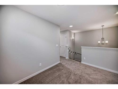 251 Aquila Way Nw, Calgary, AB - Indoor Photo Showing Other Room