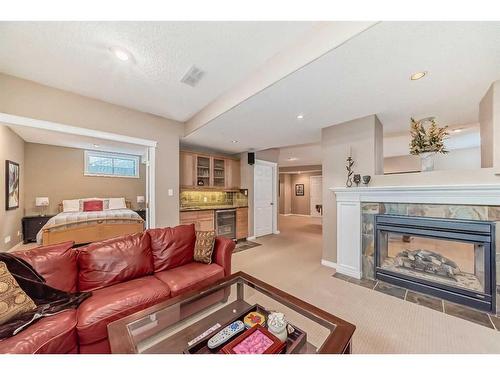 174 Mt Douglas Point Crescent, Calgary, AB - Indoor Photo Showing Living Room With Fireplace