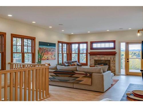 226135 1331 Drive West, Rural Foothills County, AB - Indoor Photo Showing Other Room With Fireplace