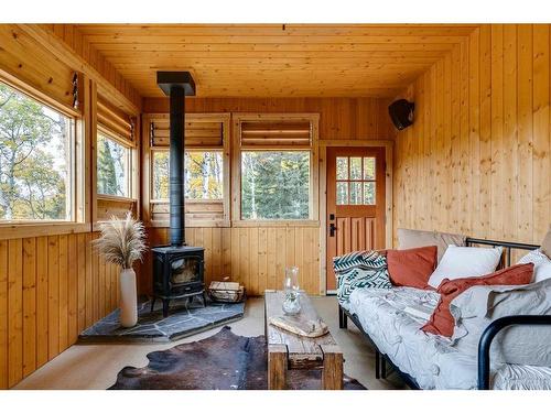 226135 1331 Drive West, Rural Foothills County, AB - Indoor Photo Showing Living Room With Fireplace