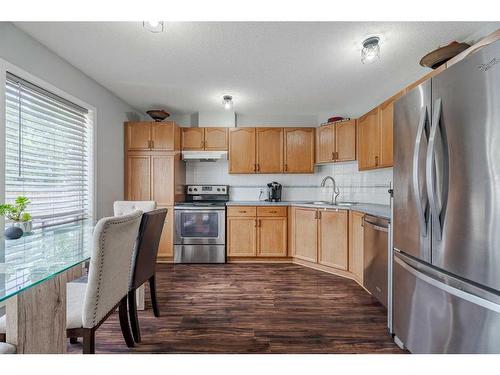 19-900 Allen Street Se, Airdrie, AB - Indoor Photo Showing Kitchen With Stainless Steel Kitchen