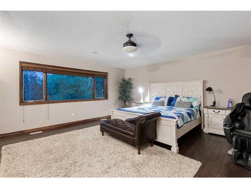 6 Rockcliff Landing Nw, Calgary, AB - Indoor Photo Showing Bedroom