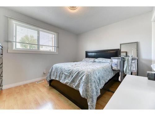 17 Doverville Way Se, Calgary, AB - Indoor Photo Showing Bedroom