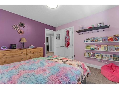 624 Harrison Court, Crossfield, AB - Indoor Photo Showing Bedroom