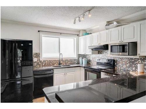 1219 15 Avenue Sw, Calgary, AB - Indoor Photo Showing Kitchen With Double Sink With Upgraded Kitchen