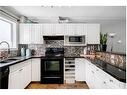 1219 15 Avenue Sw, Calgary, AB  - Indoor Photo Showing Kitchen With Double Sink 