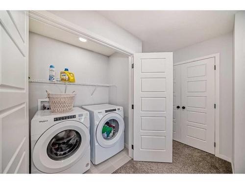 261 Aquila Drive Nw, Calgary, AB - Indoor Photo Showing Laundry Room