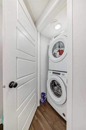 261 Aquila Drive Nw, Calgary, AB - Indoor Photo Showing Laundry Room