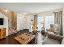 176 Elgin Meadows Park Se, Calgary, AB  - Indoor Photo Showing Living Room 