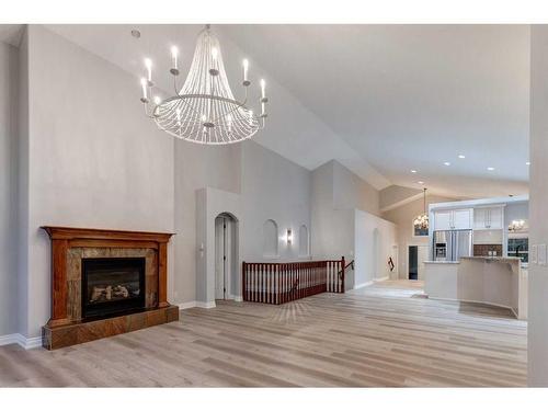 79 Discovery Ridge Park Sw, Calgary, AB - Indoor Photo Showing Living Room With Fireplace