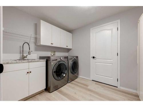 79 Discovery Ridge Park Sw, Calgary, AB - Indoor Photo Showing Laundry Room