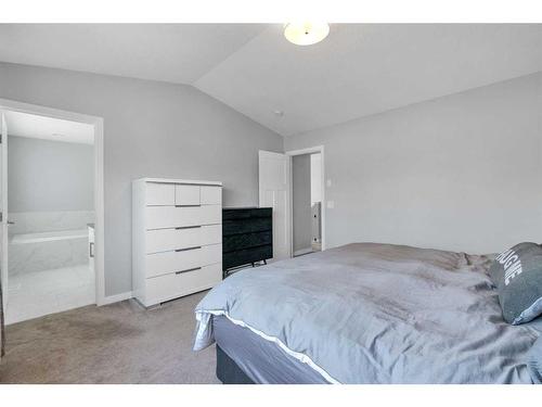 103 Masters Place Se, Calgary, AB - Indoor Photo Showing Bedroom