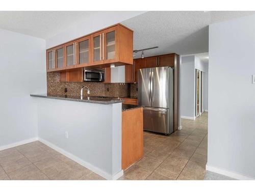 711-429 14 Street Nw, Calgary, AB - Indoor Photo Showing Kitchen