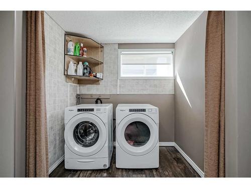 270 Tuscany Valley Drive Nw, Calgary, AB - Indoor Photo Showing Laundry Room