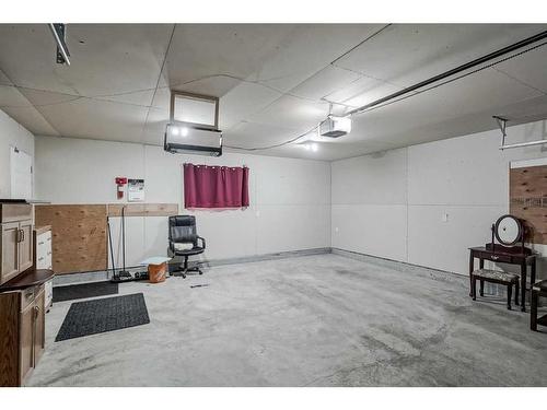 270 Tuscany Valley Drive Nw, Calgary, AB - Indoor Photo Showing Garage