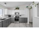 270 Tuscany Valley Drive Nw, Calgary, AB  - Indoor Photo Showing Kitchen With Double Sink 