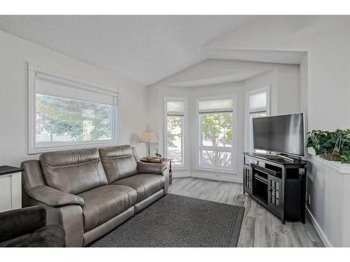 270 Tuscany Valley Drive Nw, Calgary, AB - Indoor Photo Showing Living Room