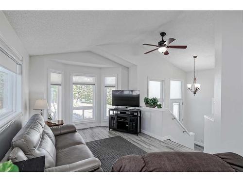 270 Tuscany Valley Drive Nw, Calgary, AB - Indoor Photo Showing Living Room