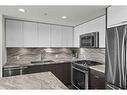 309-560 6 Avenue Se, Calgary, AB  - Indoor Photo Showing Kitchen With Stainless Steel Kitchen With Double Sink With Upgraded Kitchen 