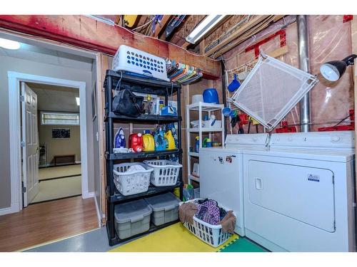 67 Hamptons Heath Nw, Calgary, AB - Indoor Photo Showing Laundry Room