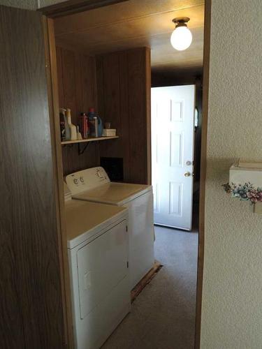 707 Highfield Drive, Carstairs, AB - Indoor Photo Showing Laundry Room