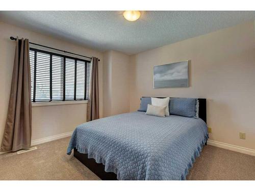 1602 Montrose Terrace Se, High River, AB - Indoor Photo Showing Bedroom