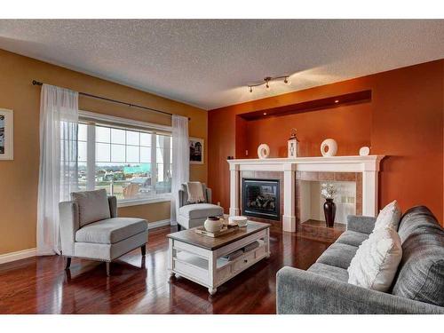 1602 Montrose Terrace Se, High River, AB - Indoor Photo Showing Living Room With Fireplace